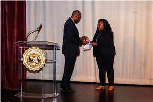 Dr. Adams Accepting HSSU Award